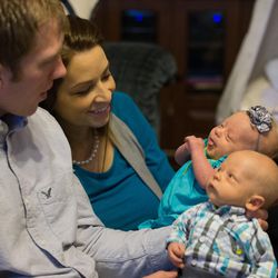 Layne and Bobbisue Christensen hold their 6-week-old twins, Ruthann and Martin, at their home in Brigham City on Tuesday, Dec. 29, 2015. 
