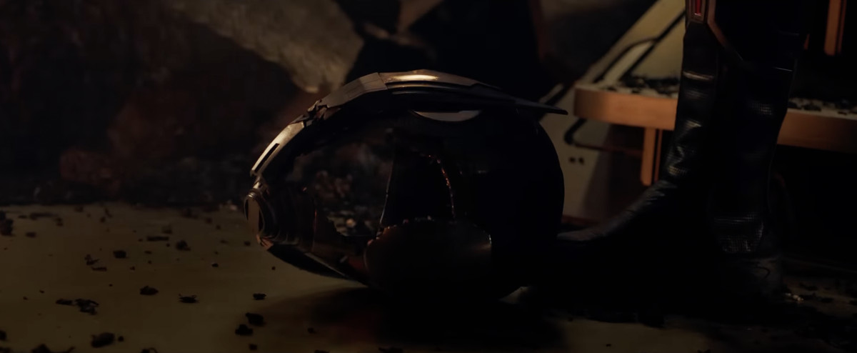 A shattered Ant-Man helmet lies on the ground in Ant-Man &amp; the Wasp: Quantumania. 