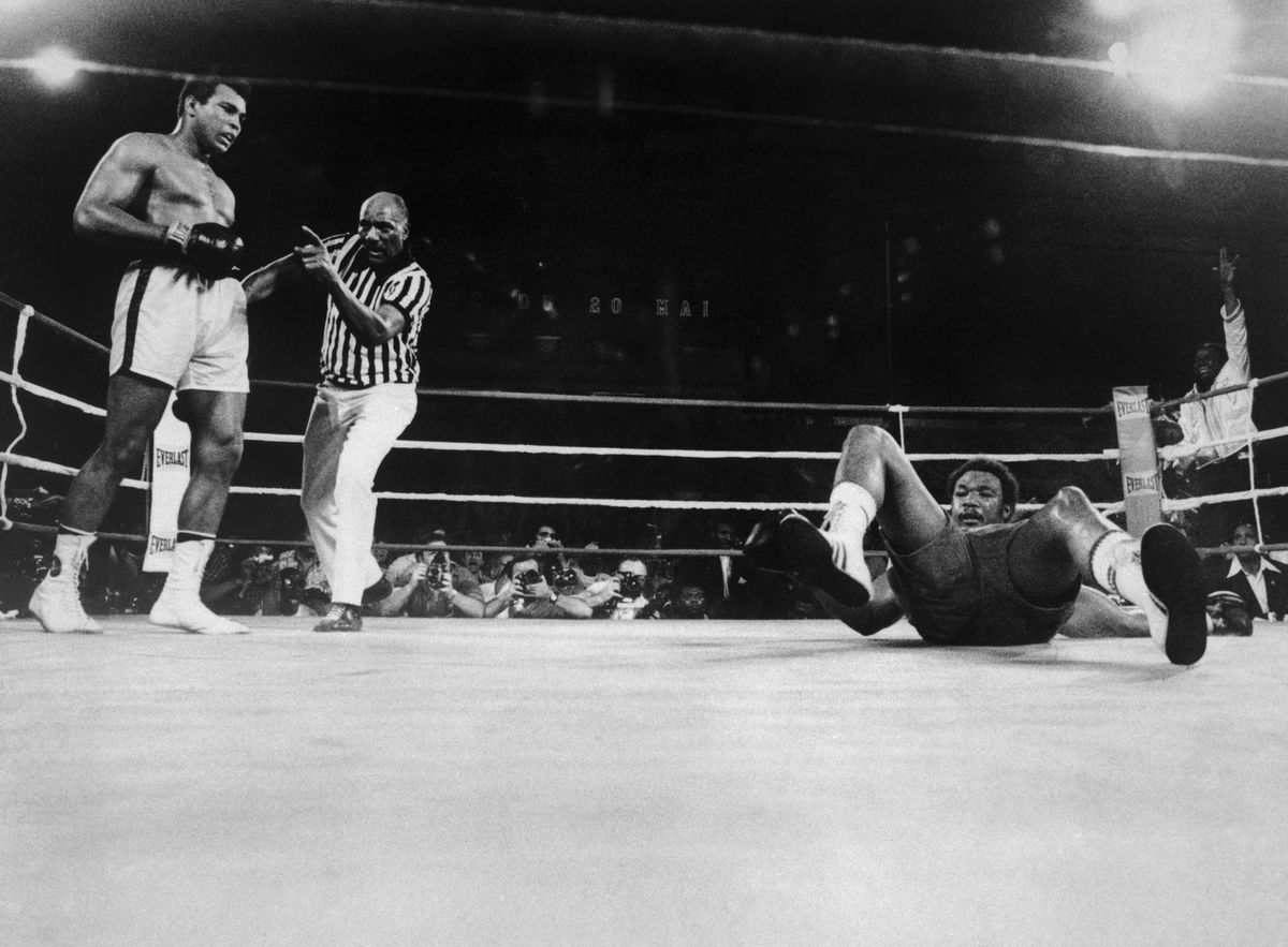 Muhammad Ali Knocks George Foreman onto the Canvas