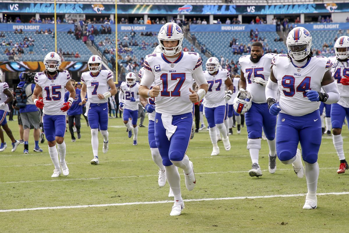 Quarterback Josh Allen #17 of the Buffalo Bills leads his team off the field after warm-ups before the start of the game against the Jacksonville Jaguars at TIAA Bank Field on November 7, 2021 in Jacksonville, Florida. The Jaguars defeated the Bills 9 to 6