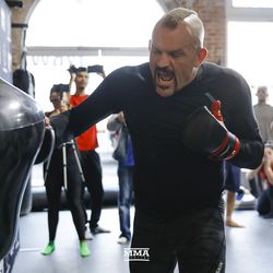Chuck Liddell smashes a bag at the Liddell vs. Ortiz 3 open workouts at Kings MMA in West Hollywood, Calif.