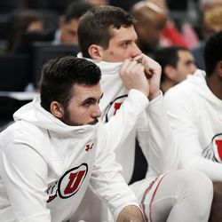 Utah Utes guard Beau Rydalch, front, reacts with teammates near the end of the game against the Oregon Ducks during the Pac-12 basketball tournament in Las Vegas on Thursday, March 8, 2018.