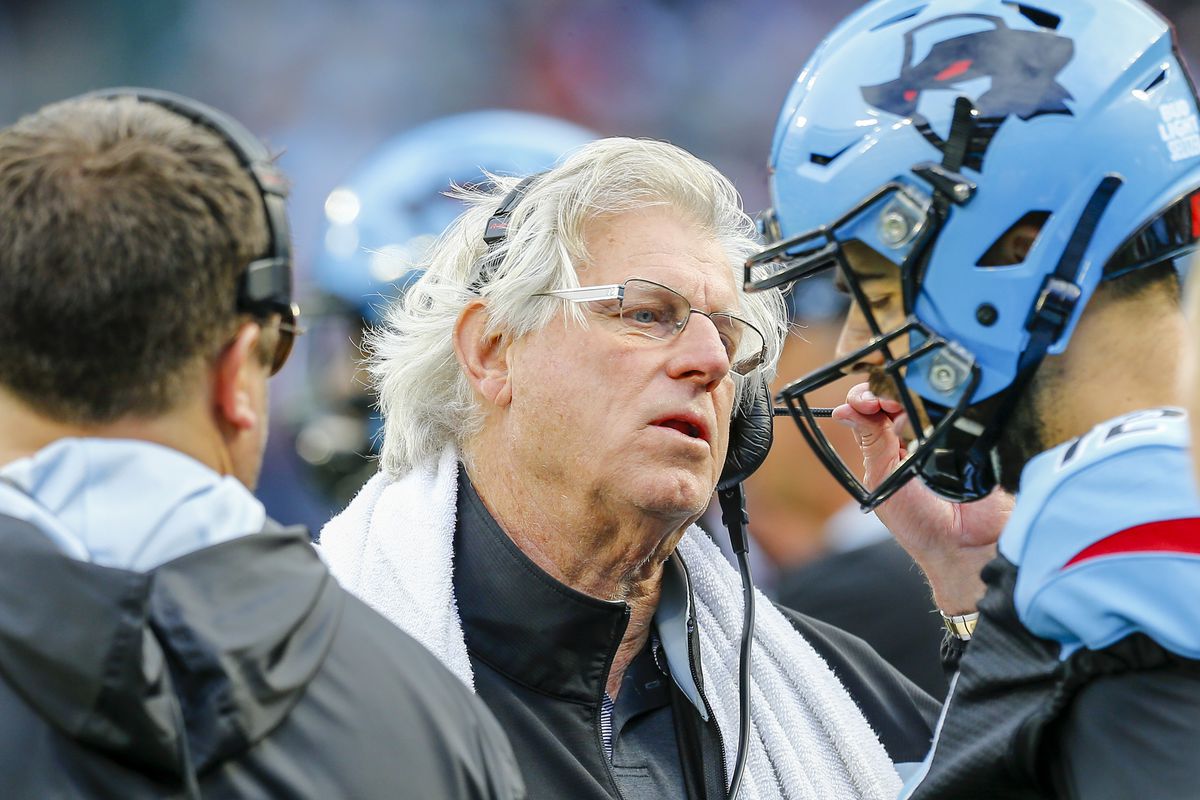 Dallas Renegades offensive coordinator Hal Mumme talks to Dallas Renegades quarterback Landry Jones on the sidelines during the game between the Dallas Renegades and the Houston Roughnecks on March 1, 2020 at Globe Life Park in Arlington. Texas.