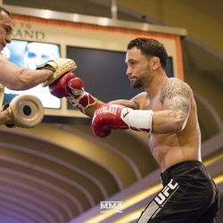 Frankie Edgar shows off his punching power at UFC 222 workouts.