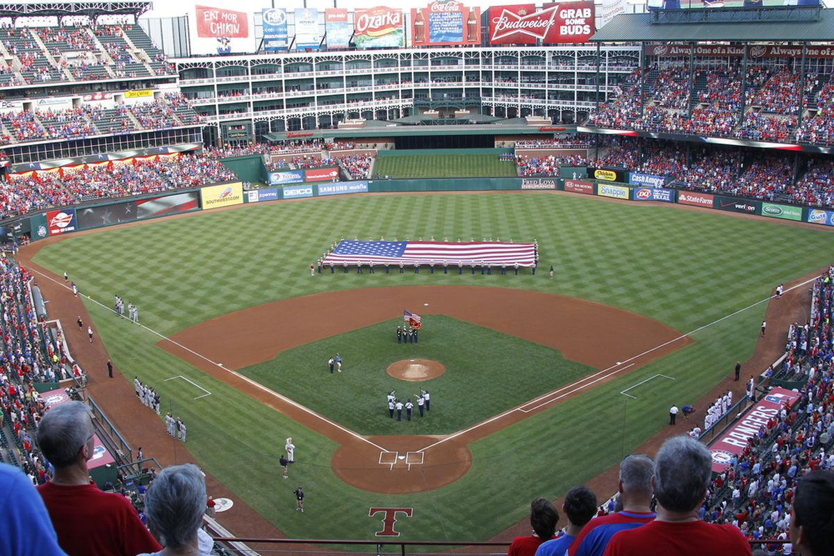 ARLINGTON, TX - MAY 28: The opening ceremonies prior to the start of the between the Seattle Mariners and the Texas Rangers at Rangers Ballpark in Arlington on May 28, 2012 in Arlington, Texas. (Photo by Rick Yeatts/Getty Images)