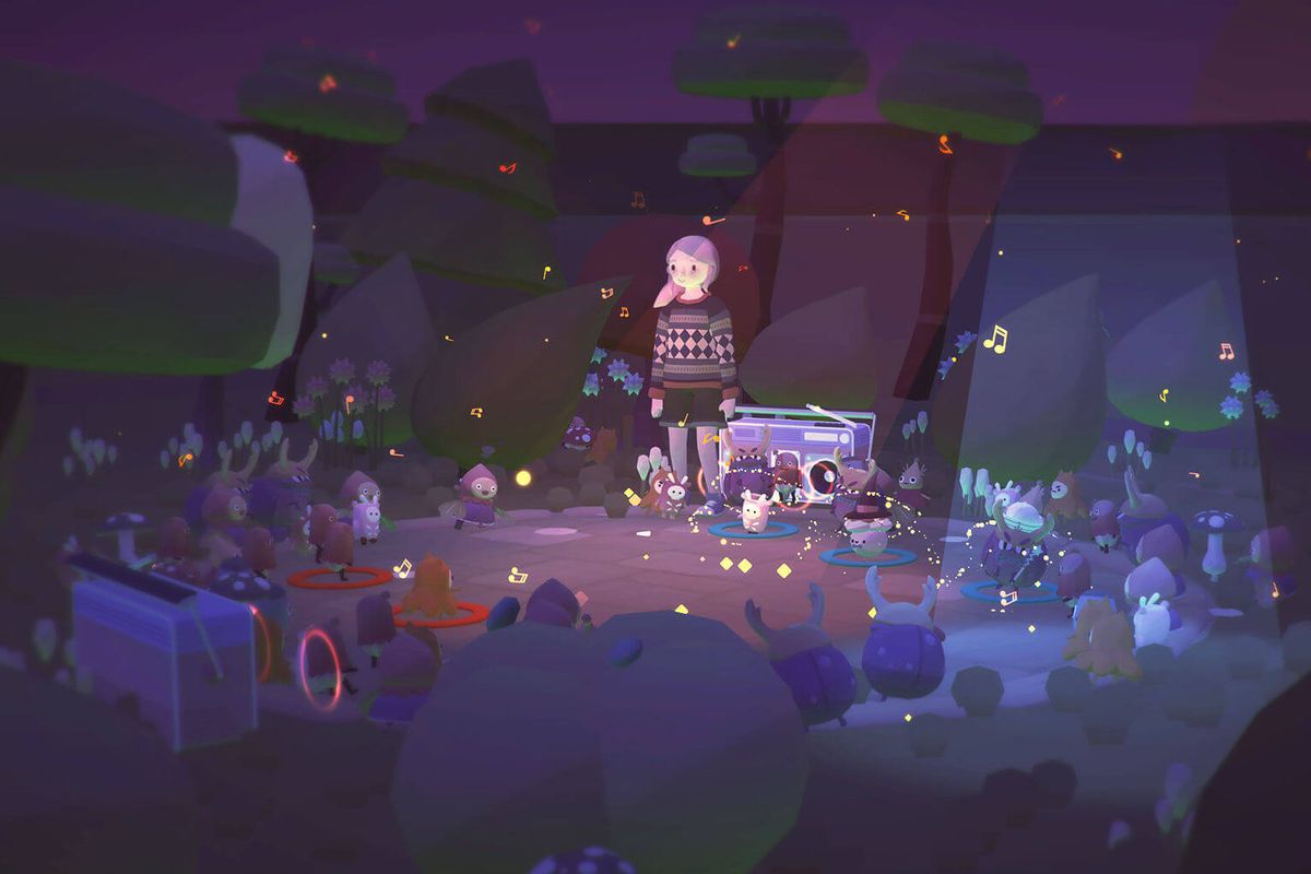 Ooblets - A girl with pink hair in a dark forest clearing, where lots of little creatures are holding a dance party.