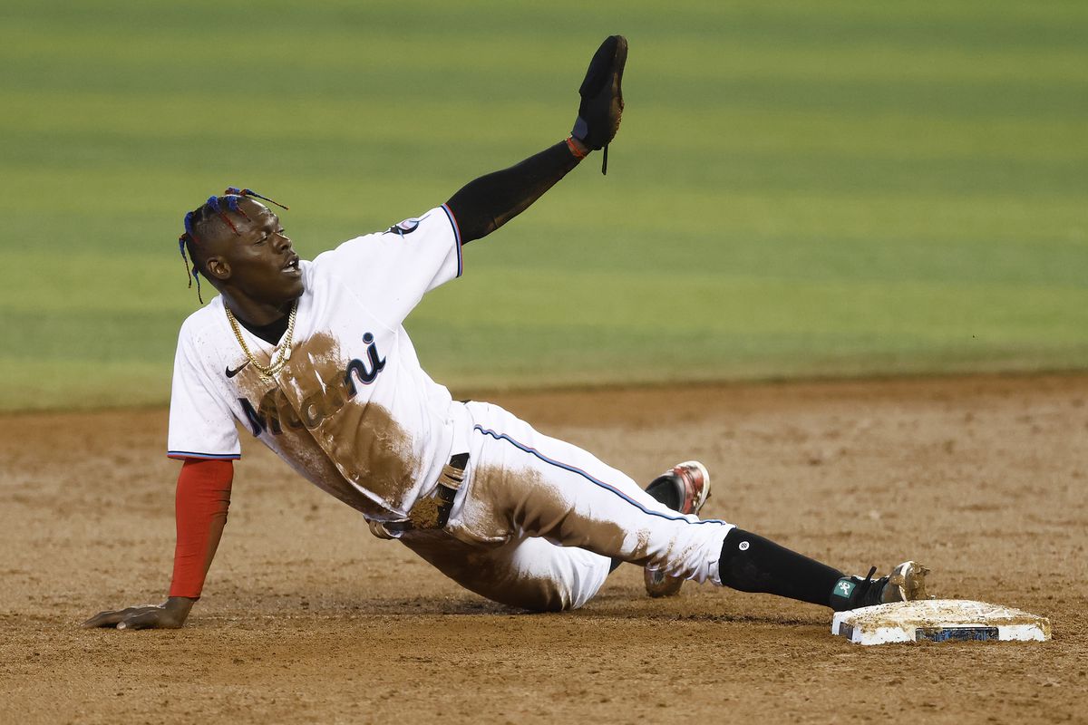 Jazz Chisholm Jr. #2 of the Miami Marlins reacts after safely stealing second base during the first inning at loanDepot Park on April 21, 2021 in Miami, Florida.