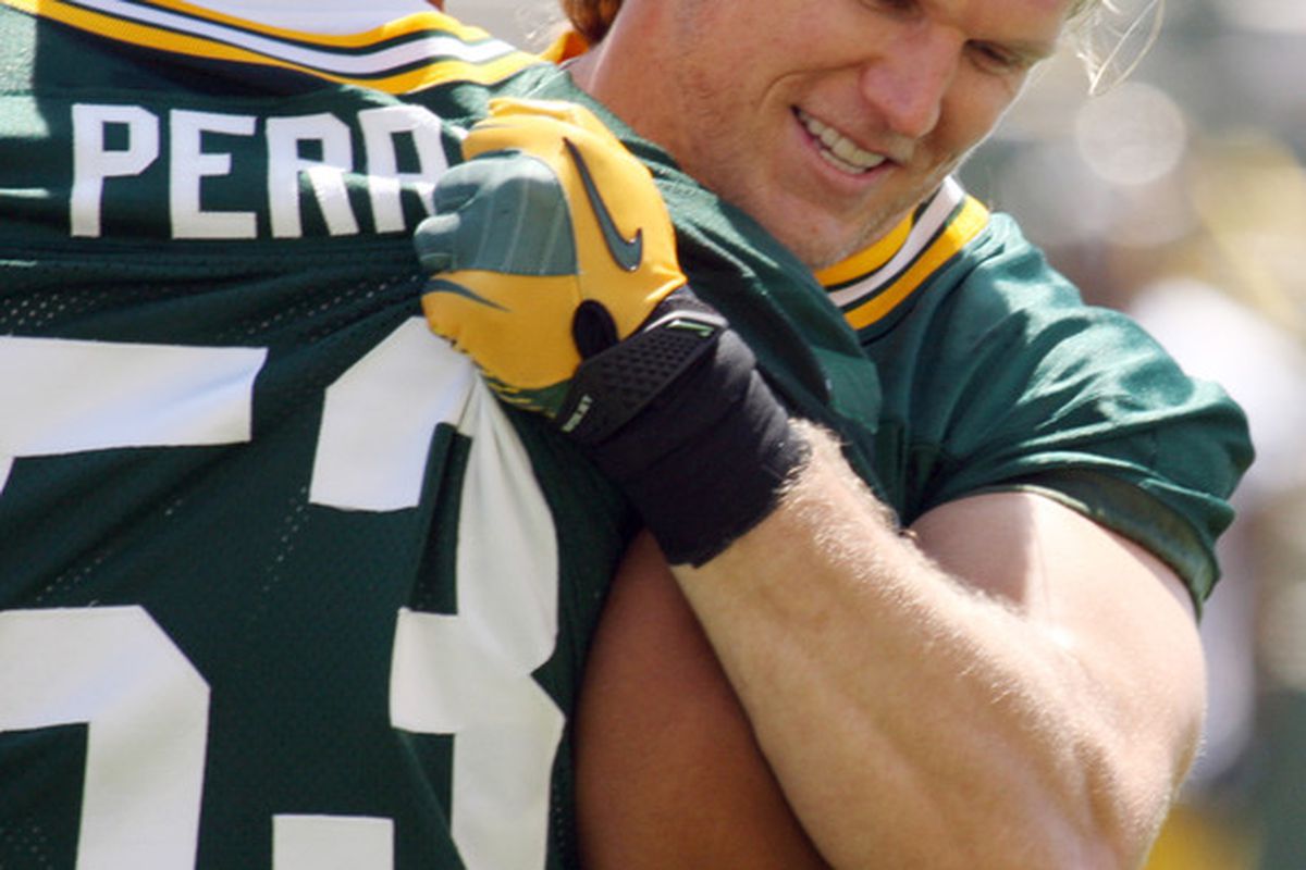 May 22, 2012; Green Bay, WI, USA; Green Bay Packers linebacker Clay Matthews (52) talks to fellow linebacker Nick Perry (53) during organized team activities at Ray Nitschke Field. Mandatory Credit: Mary Langenfeld-US PRESSWIRE