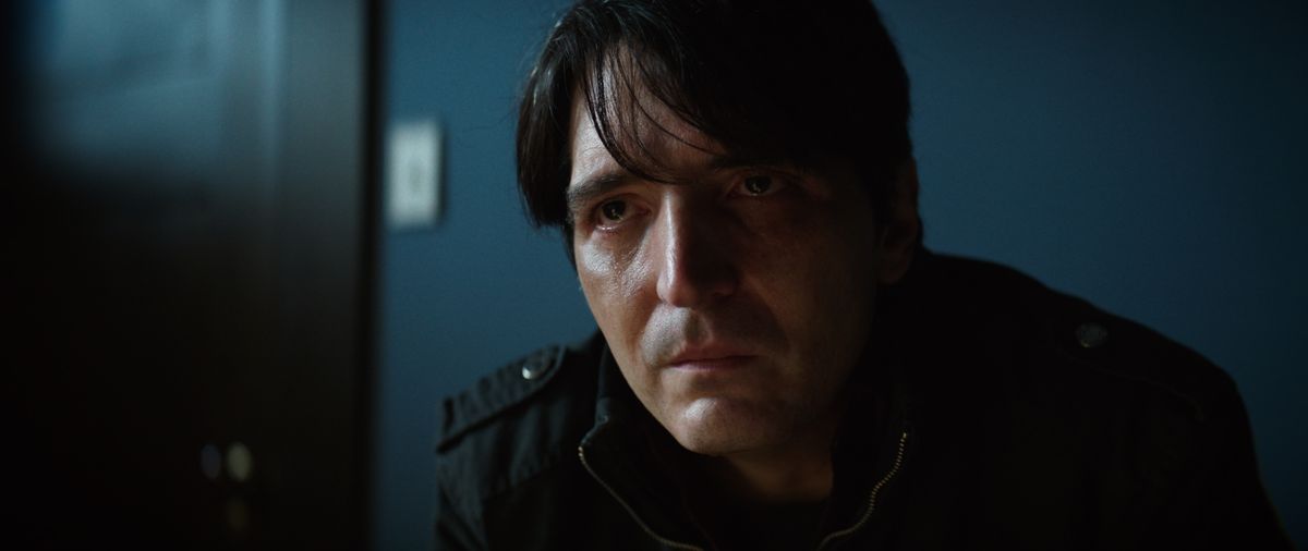 David Dastmalchian as Lester Billings, a disturbed father looking mad in The Boogeyman