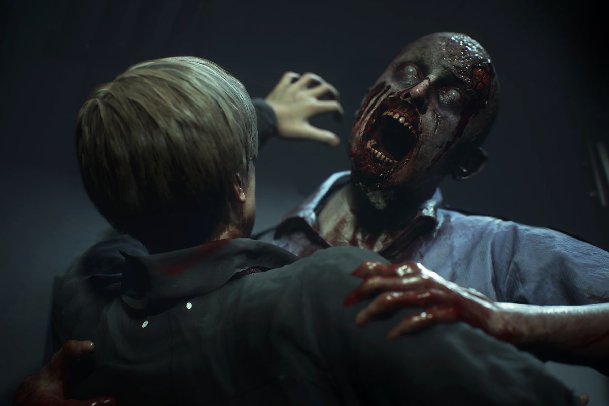 Resident Evil 2 remake — Leon Kennedy fights a zombie