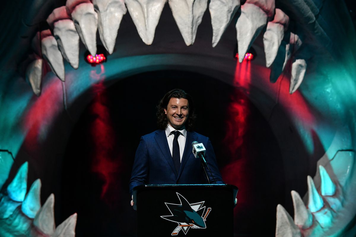 San Jose Sharks Director of Scouting Doug Wilson Jr. stands at the podium as the Sharks select William Eklund seventh overall in the first round during the 2021 NHL Draft at SAP Center on July 23, 2021 in San Jose, California.