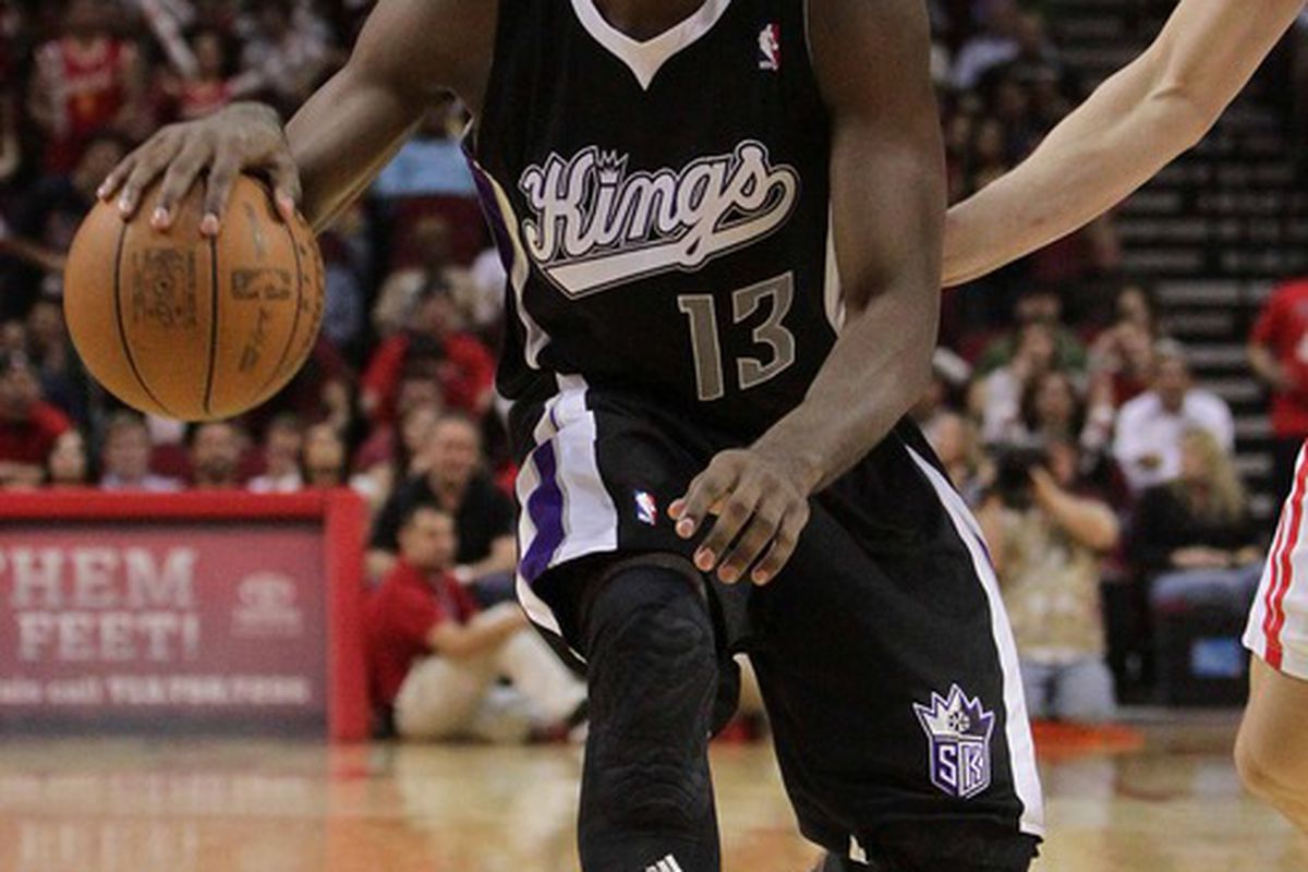 March 26, 2012; Houston, TX, USA; Sacramento Kings guard Tyreke Evans (13) controls the ball in overtime against the Houston Rockets at Toyota Center. Mandatory Credit: Troy Taormina-US PRESSWIRE
