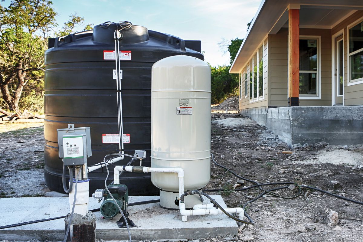 A water storage system outside a new home.