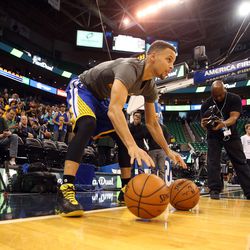Golden State Warriors guard Stephen Curry warms up before an NBA regular season game against the Utah Jazz at the Vivint Arena in Salt Lake City, Wednesday, March 30, 2016.