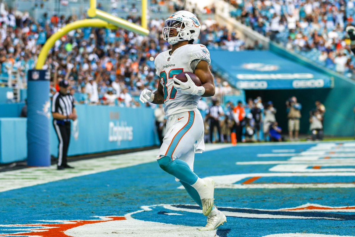 Miami Dolphins running back Myles Gaskin (37) carries the football into the end zone for a touchdown against the Carolina Panthers during the third period at Hard Rock Stadium.&nbsp;