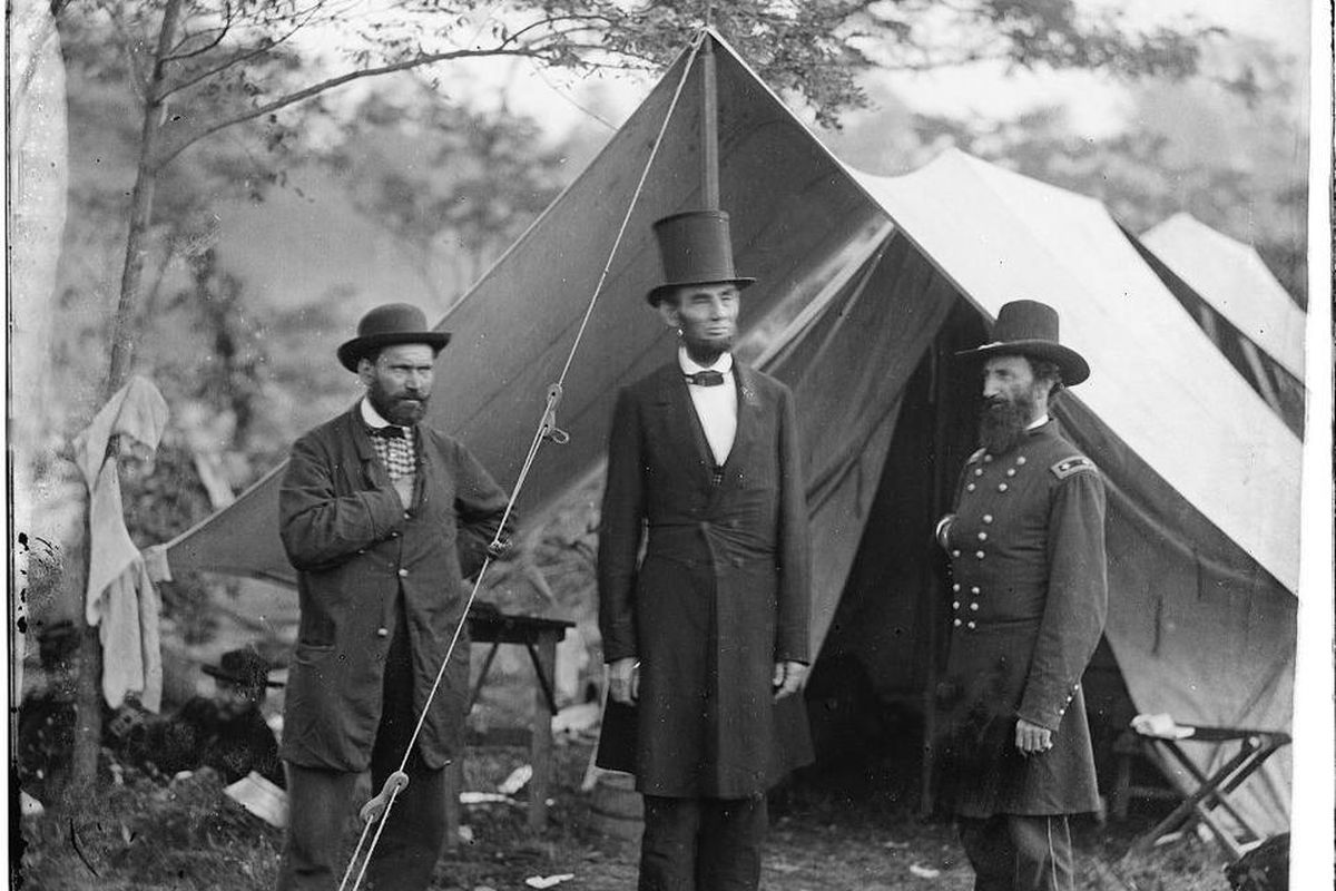 Allan Pinkerton, left, President Abraham Lincoln and Maj. Gen. John A. McClernand pose. On Feb. 23, 1861, Lincoln arrived in Washington after traveling in secret. Having been warned of a conspiracy against his life centered in Baltimore, Lincoln agreed to