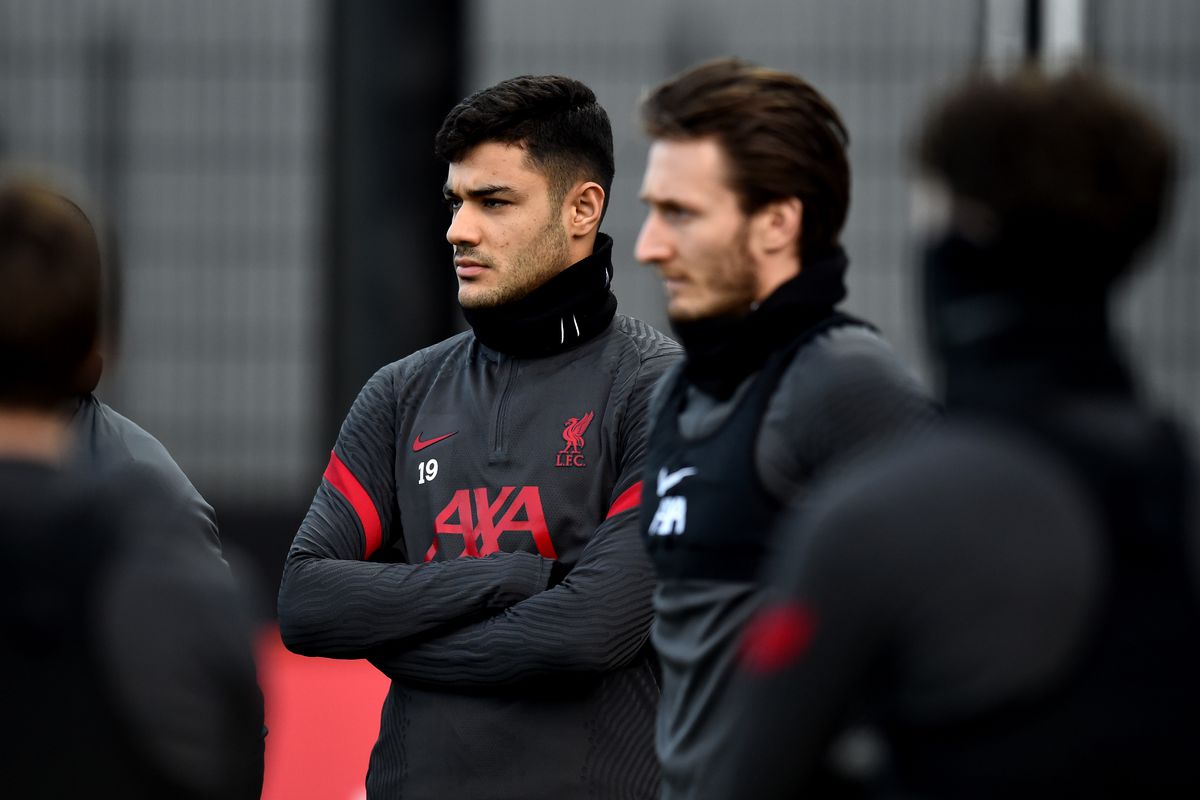 Ben Davies and Ozan Kabak of Liverpool during a training session at AXA Training Centre on February 05, 2021 in Kirkby, England.