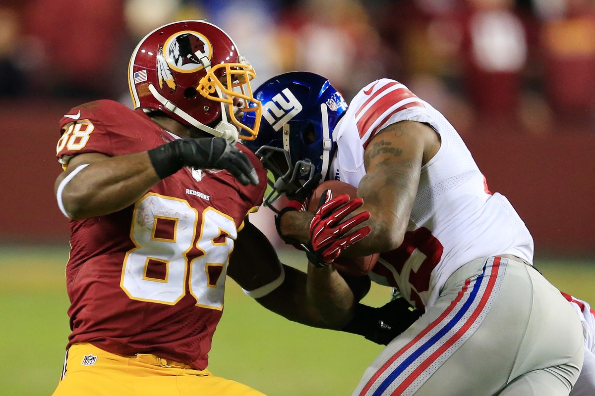 Will Hill rips the ball away from Pierre Garcon on the Redskins during Sunday's game