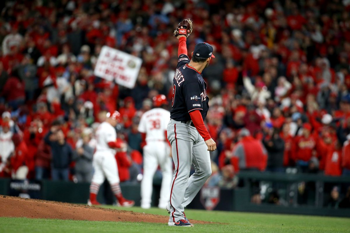 Anibal Sanchez of the Washington Nationals acknowledges Jose Martinez of the St. Louis Cardinals who singled to secure the first base hit of the game for his team during the eighth inning in game one of the NLCS at Busch Stadium on October 11, 2019.
