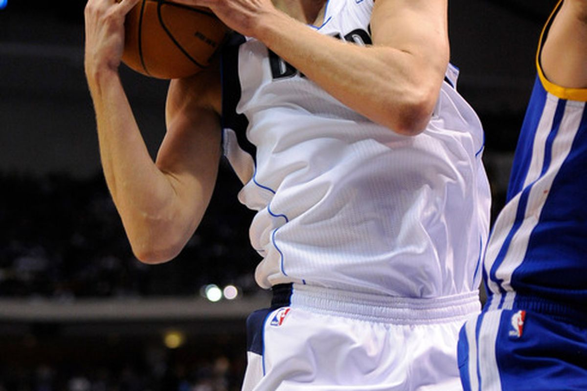 Apr 20, 2012; Dallas, TX, USA; Dallas Mavericks power forward Dirk Nowitzki (41) grabs a rebound during the second quarter against the Golden State Warriors at the American Airlines Center. Mandatory Credit: Jerome Miron-US PRESSWIRE