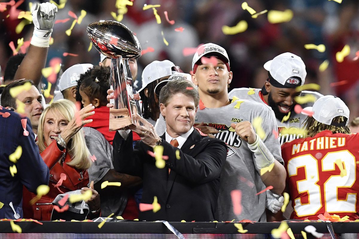 Clark Hunt, Kansas City Chiefs owner and CEO, hoists the Vince Lombardi Trophy after the team’s 31-20 victory in Super Bowl LIV against the San Francisco 49ers on February 2, 2020, at Hard Rock Stadium in Miami Gardens, Fla.