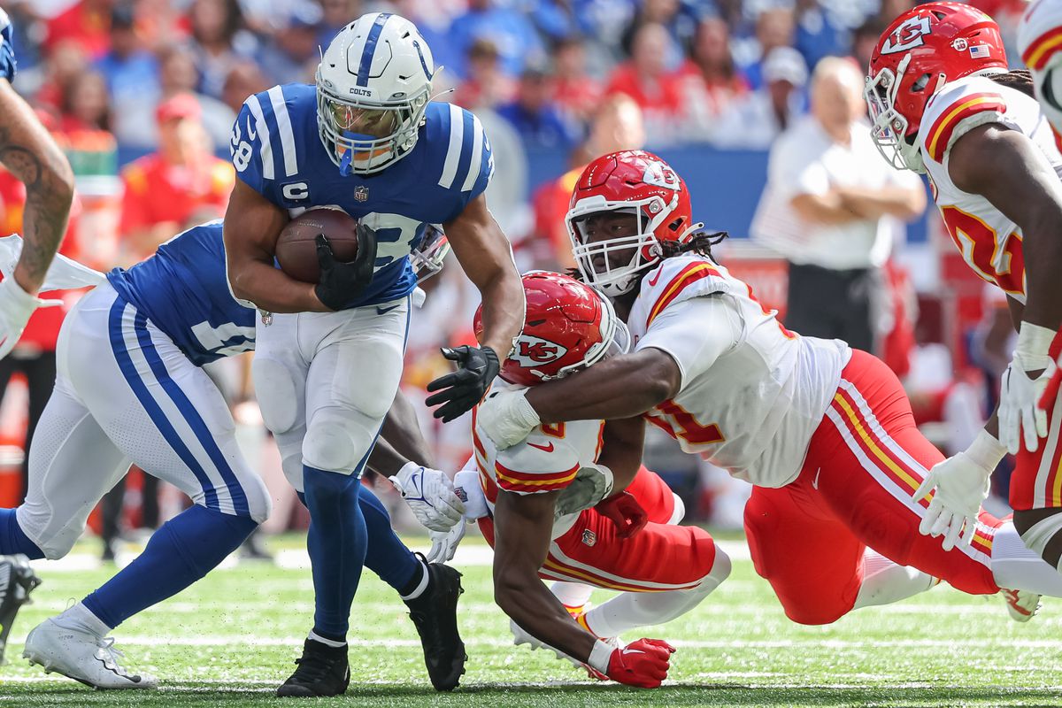 Jonathan Taylor of the Indianapolis Colts runs the ball during the game against the Kansas City Chiefs at Lucas Oil Stadium on September 25, 2022 in Indianapolis, Indiana.