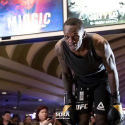 Israel Adesanya catches his breath at TUF 27 FInale workouts.