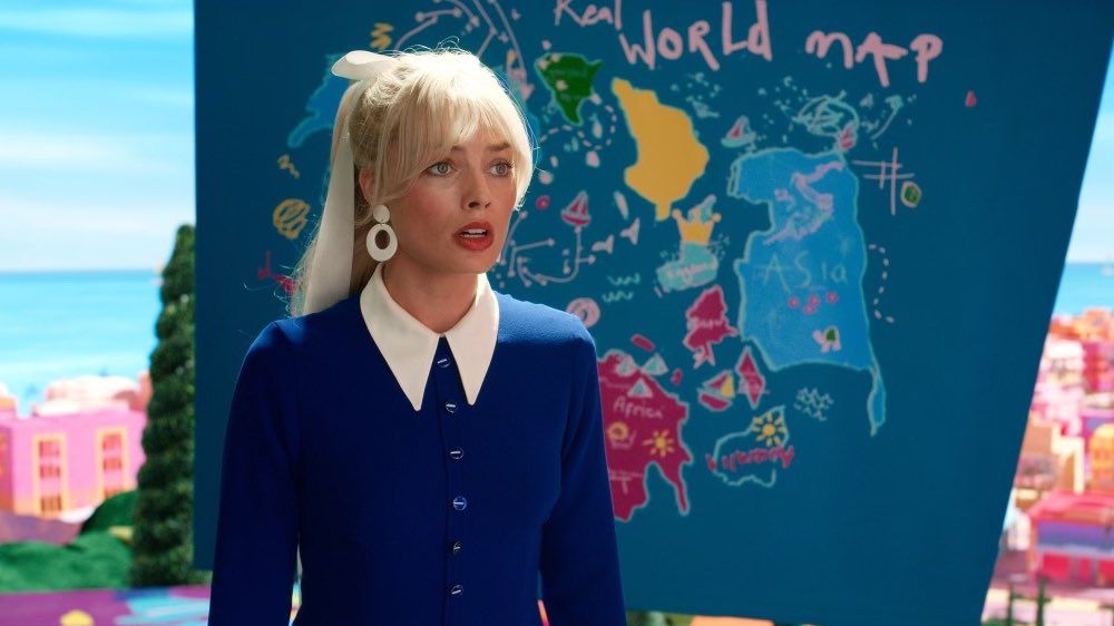 Barbie (Margot Robbie) in front of a map including the Nine-dash line.
