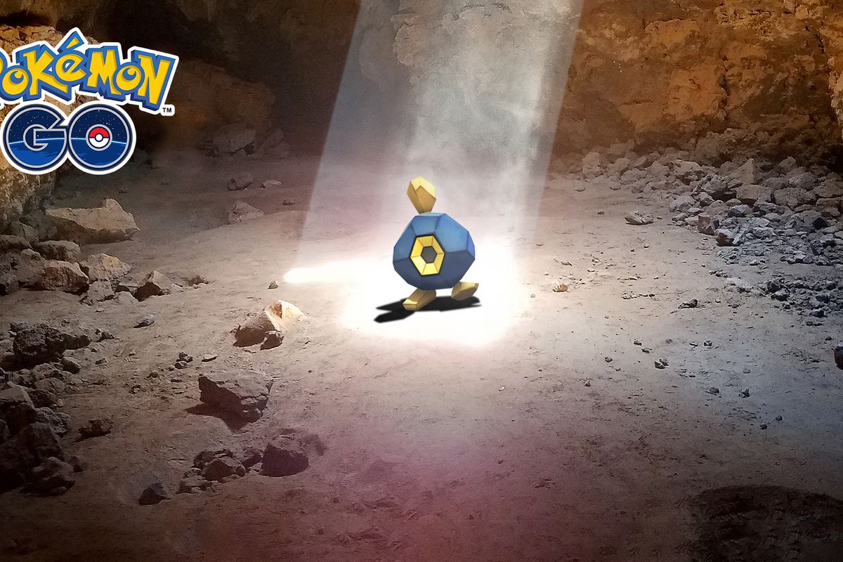 Artwork of the Pokémon Roggenrola in a cave, lit by a light beam from above, for Pokémon Go.