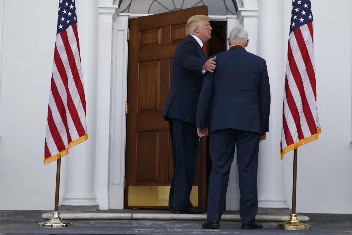Vice President Mike Pence and President Donald Trump leave after the president spoke to reporters at Trump National Golf Club, in Bedminster, N.J., Thursday, Aug. 10, 2017. (AP Photo/Evan Vucci)