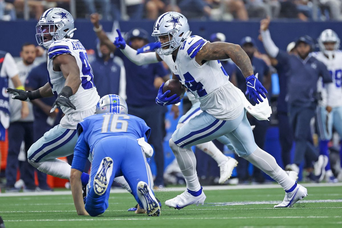 Dallas Cowboys defensive end Sam Williams (54) strips the ball from Detroit Lions quarterback Jared Goff (16) and recovers the fumble during the second half at AT&amp;amp;T Stadium.