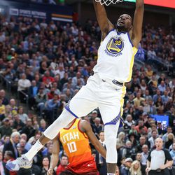 Golden State Warriors forward Kevin Durant (35) dunks during the game against the Utah Jazz at Vivint Arena in Salt Lake City on Tuesday, Jan. 30, 2018.