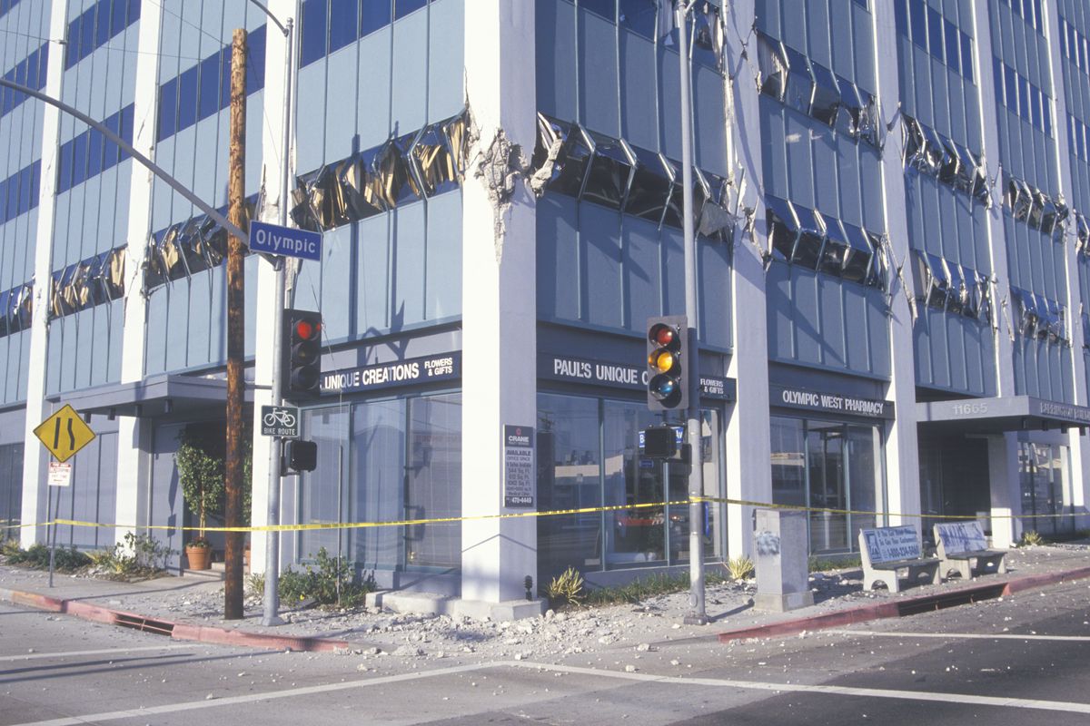 A glass office building with broken windows due to the 1994 Northridge earthquake.
