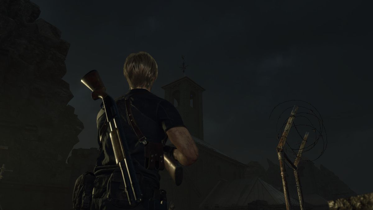 Leon S Kennedy looks at a blue medallion in the tower on top of the Specimen Storage building