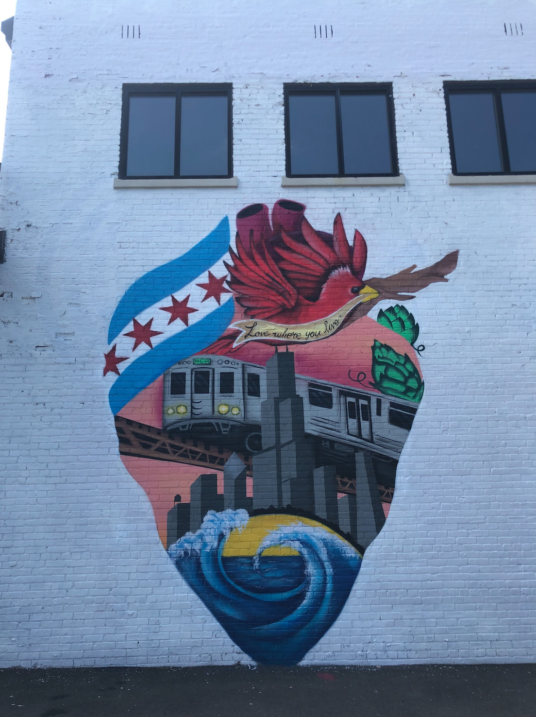 A mural by Christian Paz in the 2100 block of West Walnut Street.