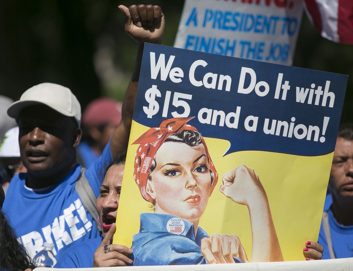Demonstrators call for a higher minimum wage.