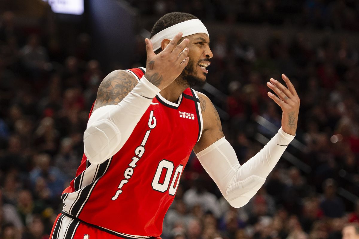 Portland Trail Blazers forward Carmelo Anthony reacts to a foul being called by an official during the second half against the Indiana Pacers at Moda Center.