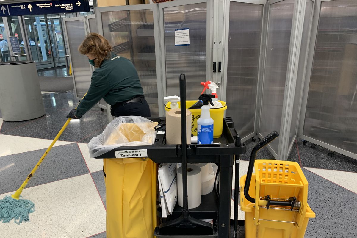 A United Maintenance Company Inc. employee at work Tuesday at O’Hare Airport. The company is suing City Hall in an effort to hold onto a janitorial services deal that’s paid it almost $200 million over nearly a decade.