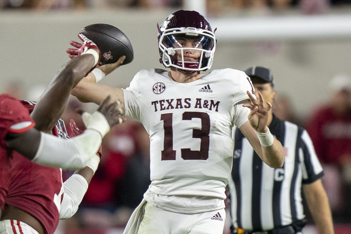 Texas A&amp;M Aggies quarterback Haynes King looks to pass against the Alabama Crimson Tide during the second half at Bryant-Denny Stadium.
