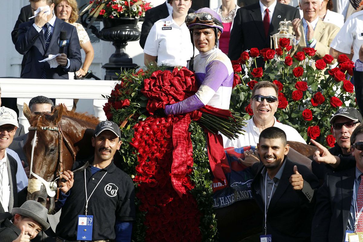 May 5, 2012; Louisville, KY, USA; Mario Gutierrez aboard I'll Have Another is celebrates in the winner's circle after winning the 138th running of the Kentucky Derby at Churchill Downs. Brian Spurlock-US PRESSWIRE