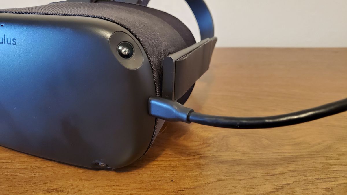 An Oculus Quest with a USB-C cable connected