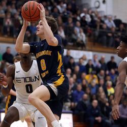 Glenbrook South’s Jimmy McMahon (0) drives to the basket against Evanston in their 68-60 loss in Skokie Tuesday, March 5, 2019. | Kevin Tanaka/For the Sun Times
