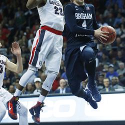 Brigham Young Cougars guard Nick Emery (4) scores past Gonzaga Bulldogs guard Eric McClellan (23) during the WCC tournament in Las Vegas Monday, March 7, 2016. BYU lost 88-84.