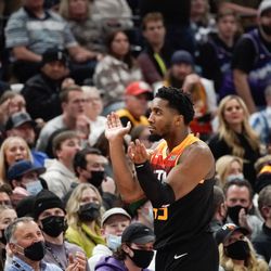 Utah Jazz guard Donovan Mitchell reacts towards the crowd after a 3-pointer against the Minnesota Timberwolves during an NBA game at Vivint Arena in Salt Lake City on Friday, Dec. 31, 2021.