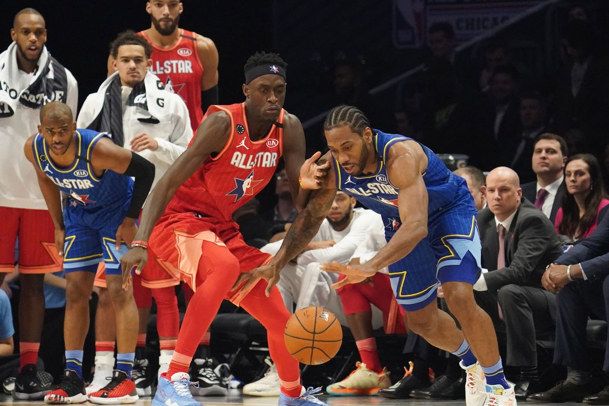 Team LeBron forward Kawhi Leonard of the LA Clippers chases the ball with Team Giannis forward Pascal Siakam of the Toronto Raptors during the third quarter of the 2020 NBA All Star Game at United Center.