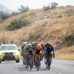 Cyclists ride through Hill Air Force Base during Stage 5 of the Tour of Utah on Friday, Aug. 4, 2017.