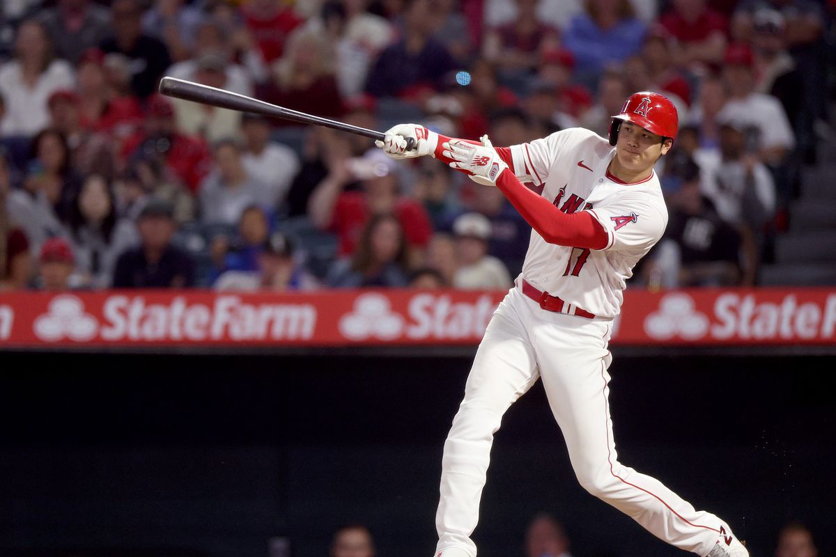 Shohei Ohtani of the Los Angeles Angels hits a solo home run, to take a 3-1 lead over the Chicago White Sox, during the seventh inning at Angel Stadium of Anaheim on June 27, 2023 in Anaheim, California.