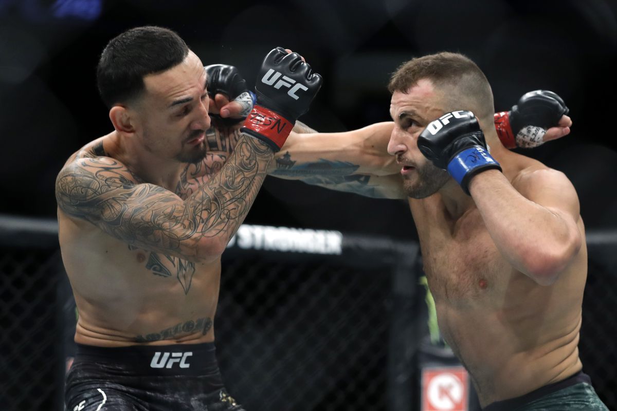 Alexander Volkanovski battles with UFC featherweight champion Max Holloway in their title fight during UFC 245 at T-Mobile Arena on December 14, 2019 in Las Vegas, Nevada. Volkanovski took the title by unanimous decision.