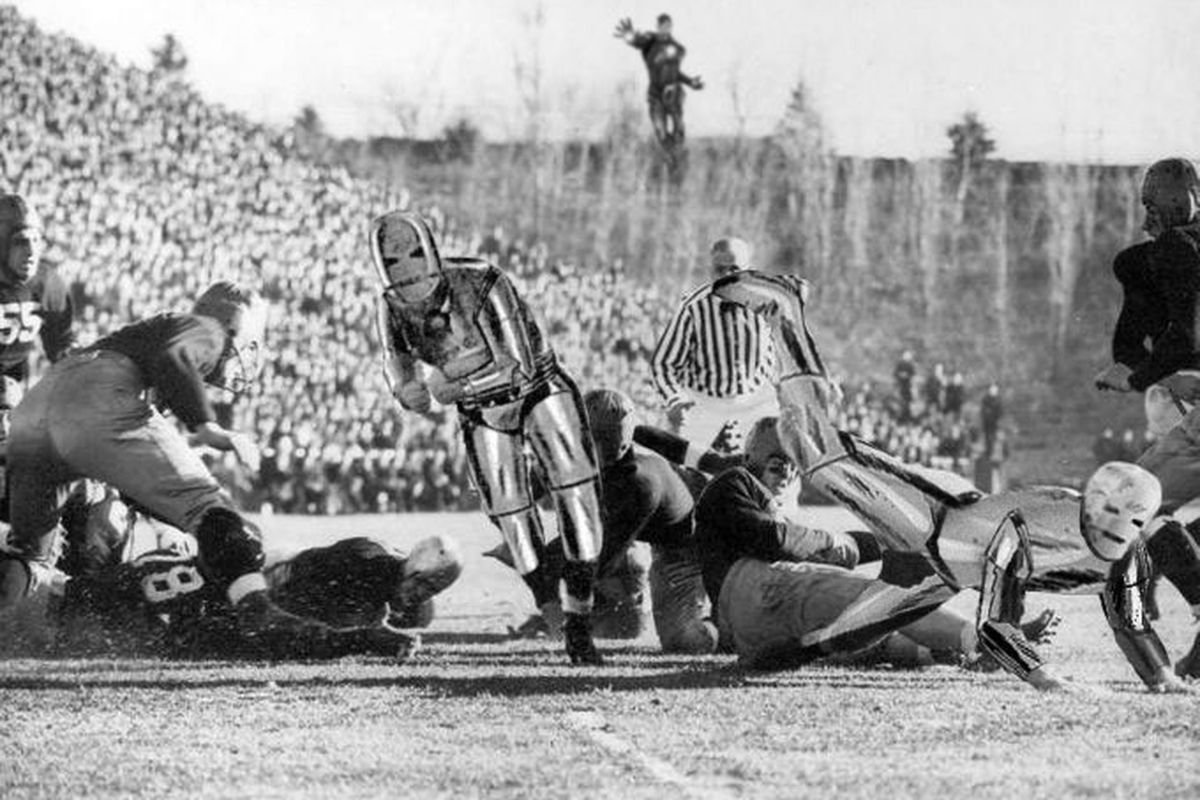 This photo, which a researcher calls "the smoking gun", shows Nile Kinnick bursting through the line while wearing possibly illegal gear.