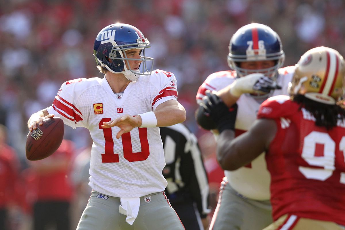 SAN FRANCISCO, CA - NOVEMBER 13:  Eli Manning #10 of the New York Giants drops back to pass against the San Francisco 49ers at Candlestick Park on November 13, 2011 in San Francisco, California.  (Photo by Ezra Shaw/Getty Images)